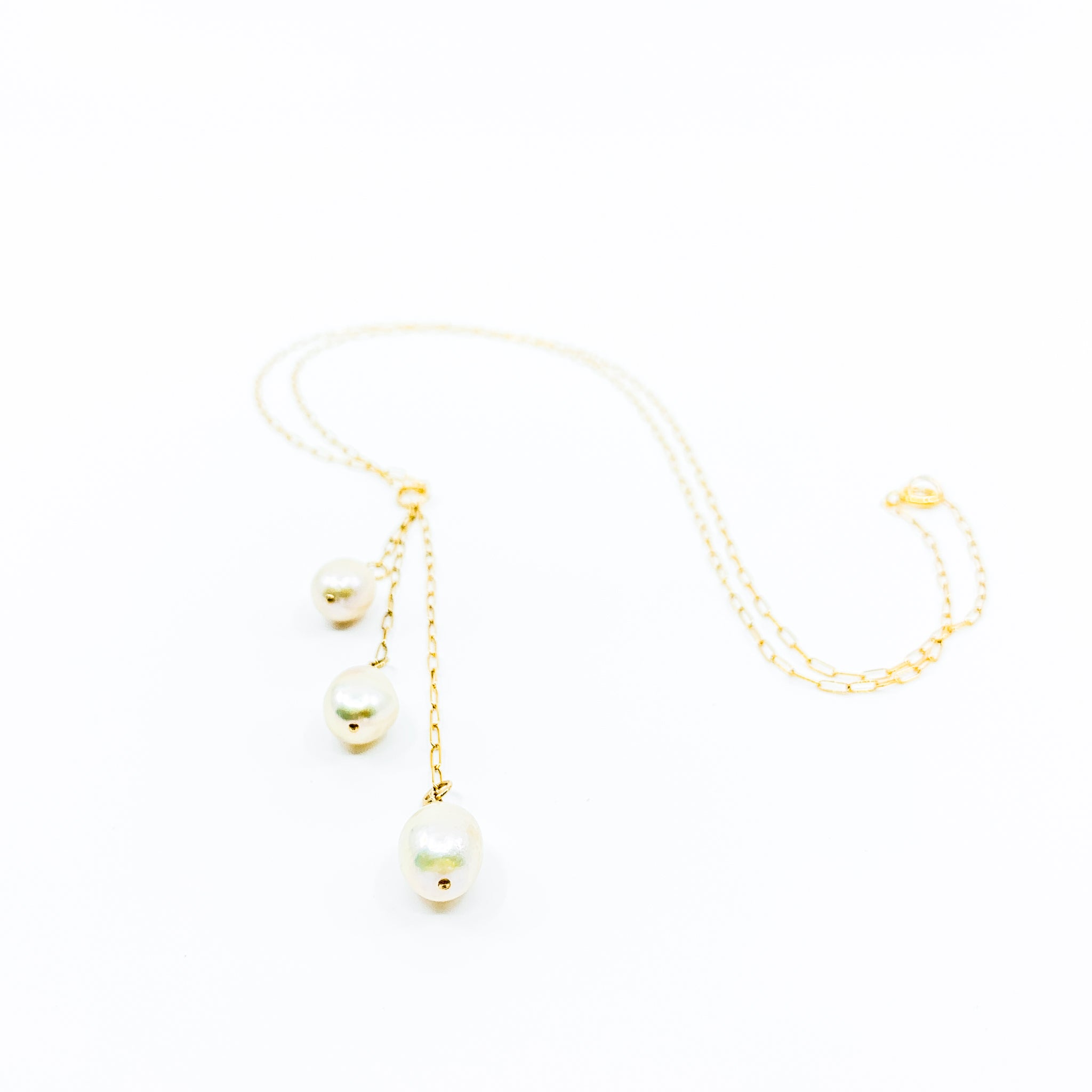 waterfall style gold necklace with 3 white pearls by eve black jewelry made in Hawaii  Edit alt text
