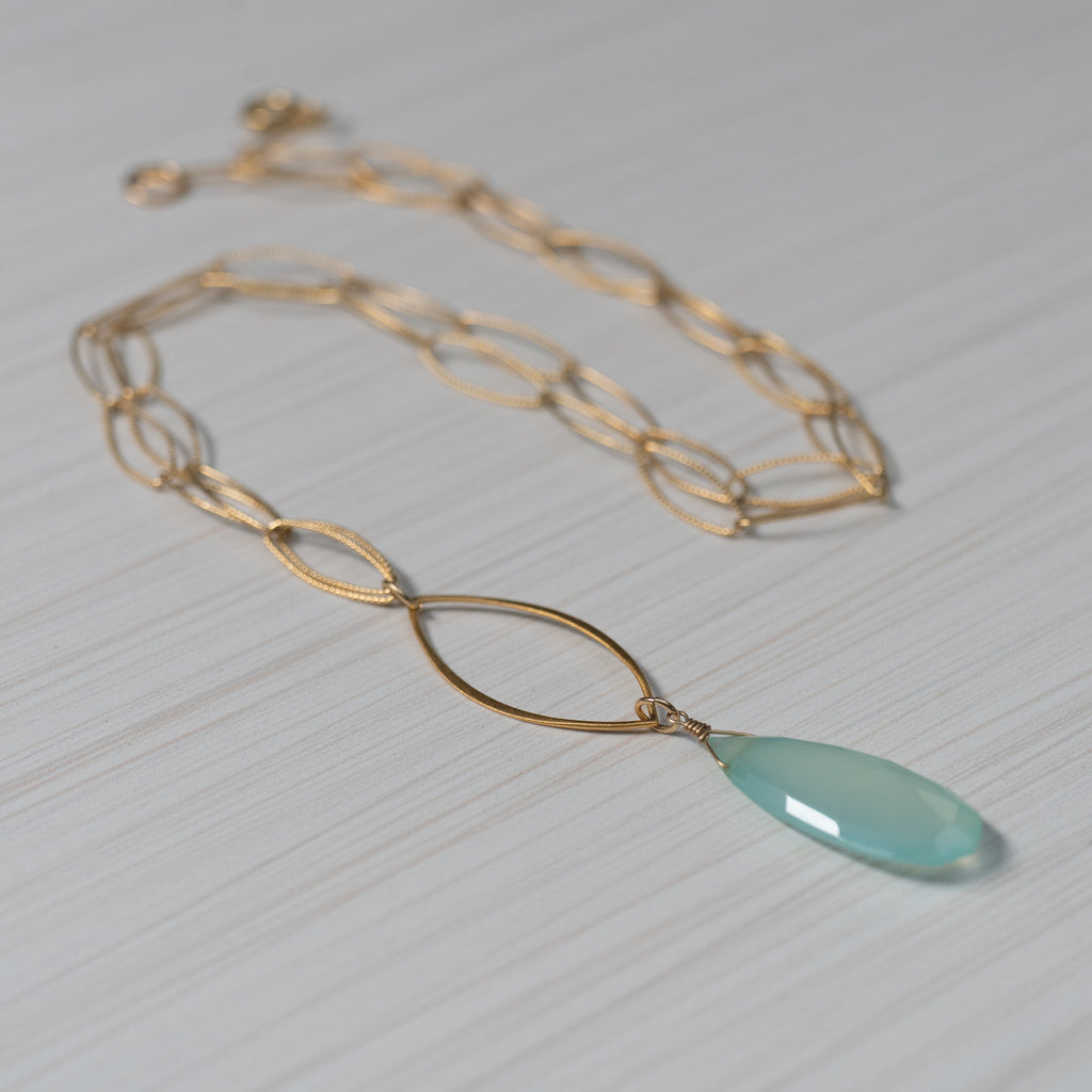 blue gemstone gold necklace handmade in Hawaii by eve black jewelry