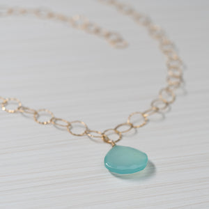 blue gemstone gold necklace handmade in hawaii by eve black jewelry  Edit alt text