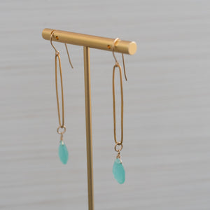 blue gemstone long ellipse shape gold earrings  Edit alt text