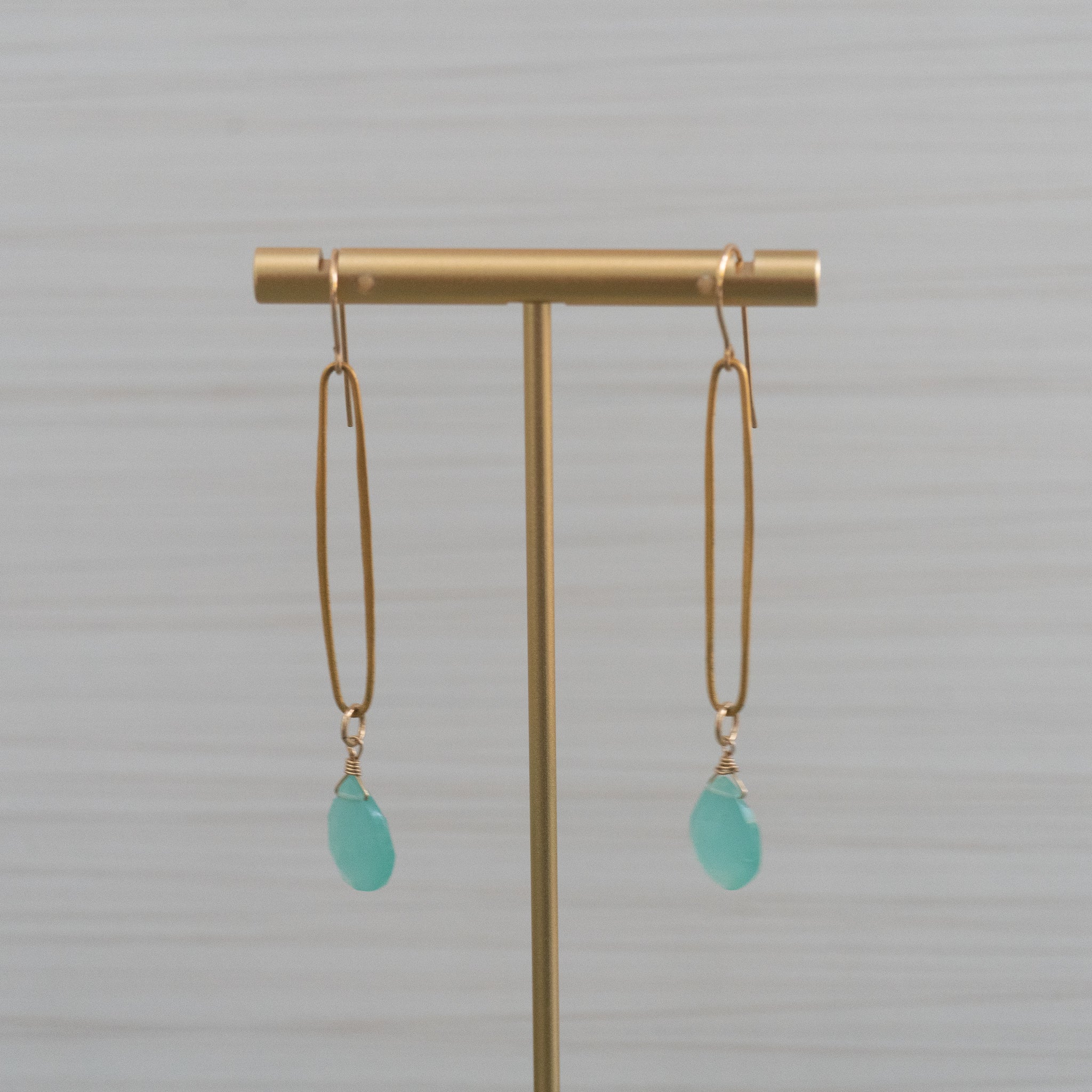 blue gemstone long ellipse shape gold earrings