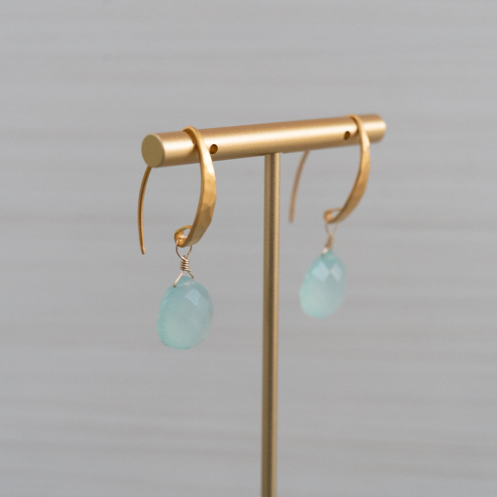 matte gold hammered earrings with blue gemstones