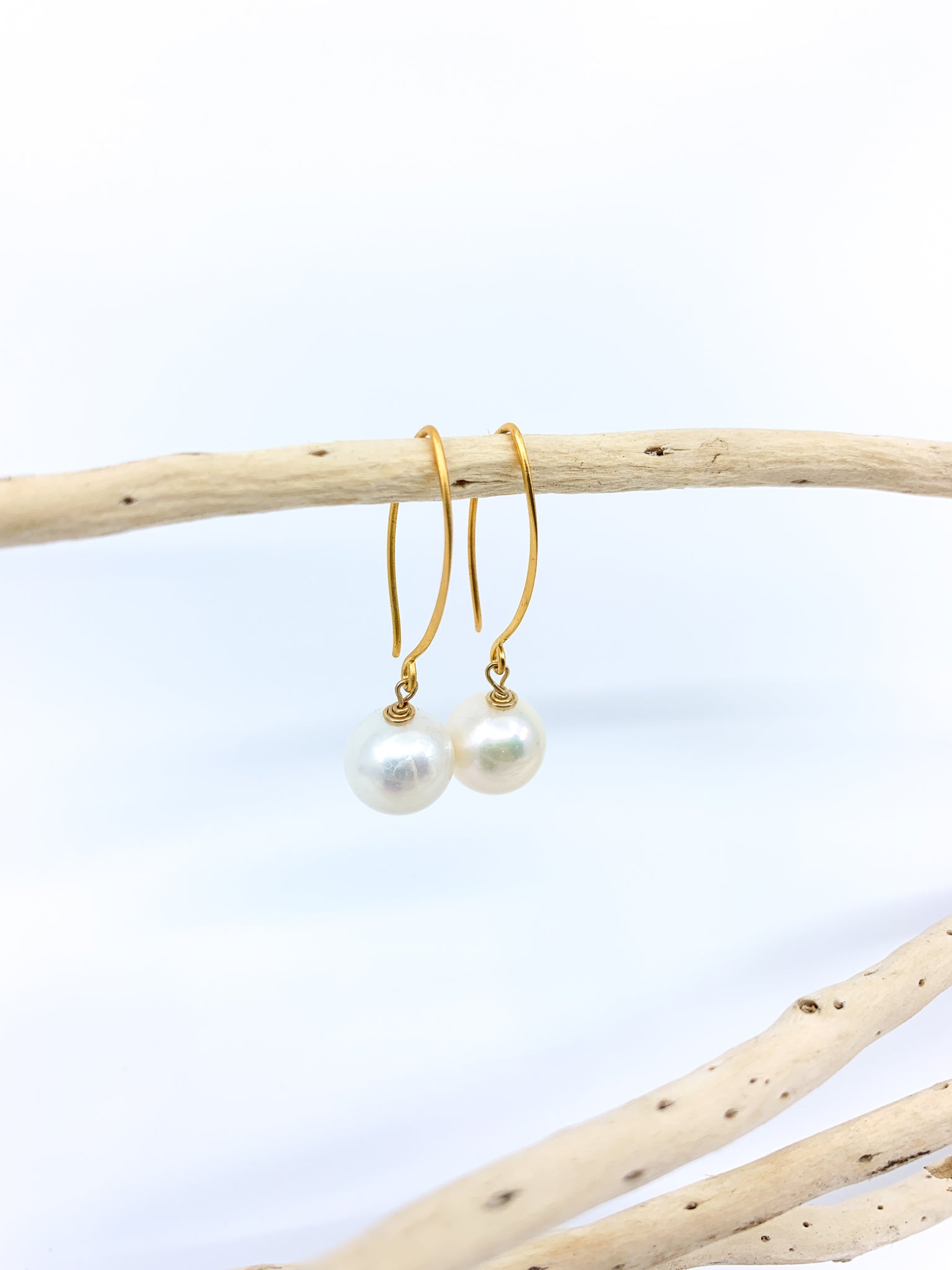 white pearl earrings short gold hook by eve black jewelry made in Hawaii