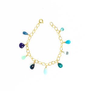 mixed blue gemstones gold charm bracelet by eve black jewelry made in hawaii  Edit alt text