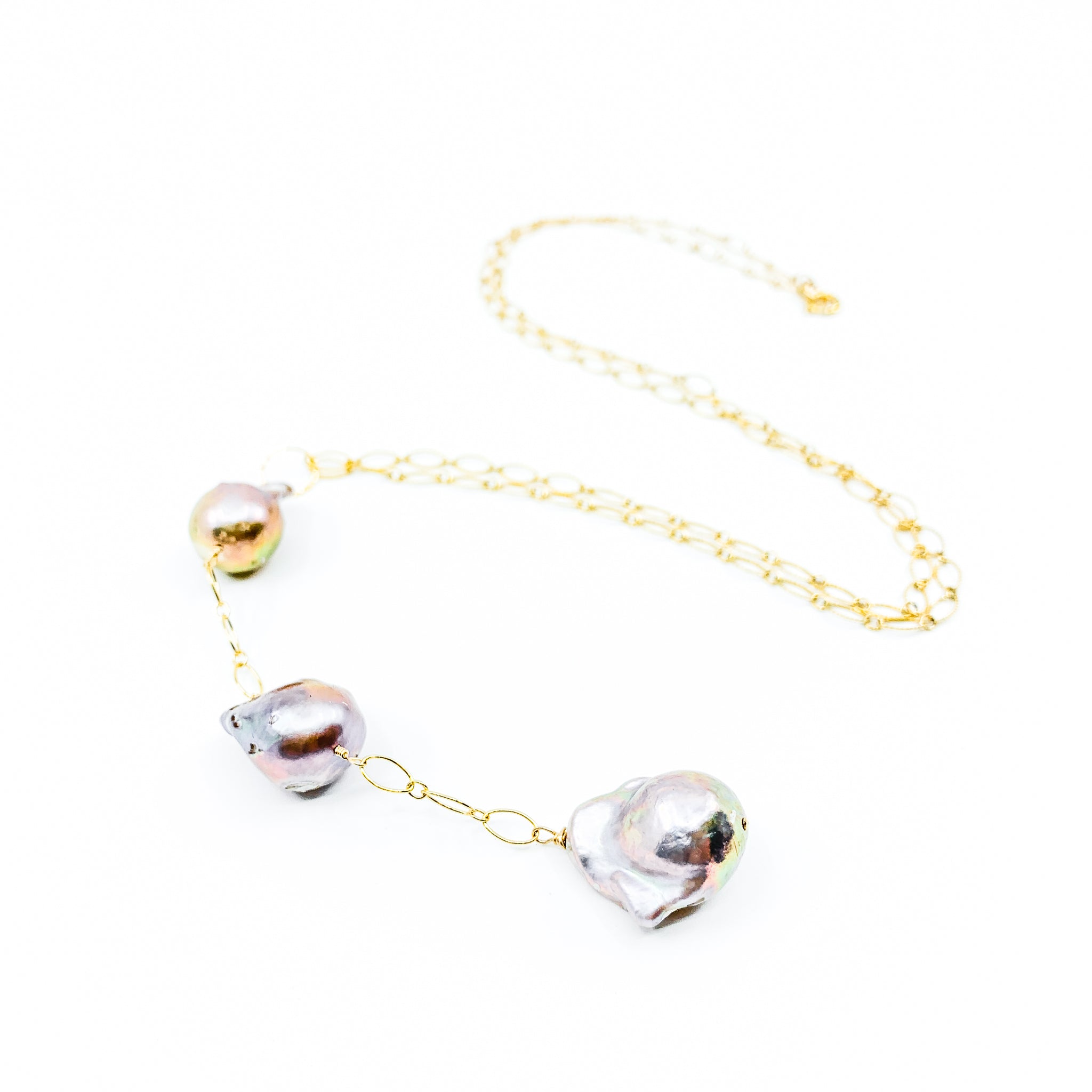 3 natural colored pink edison pearls on long gold chain by eve black jewelry made in Hawaii  Edit alt text