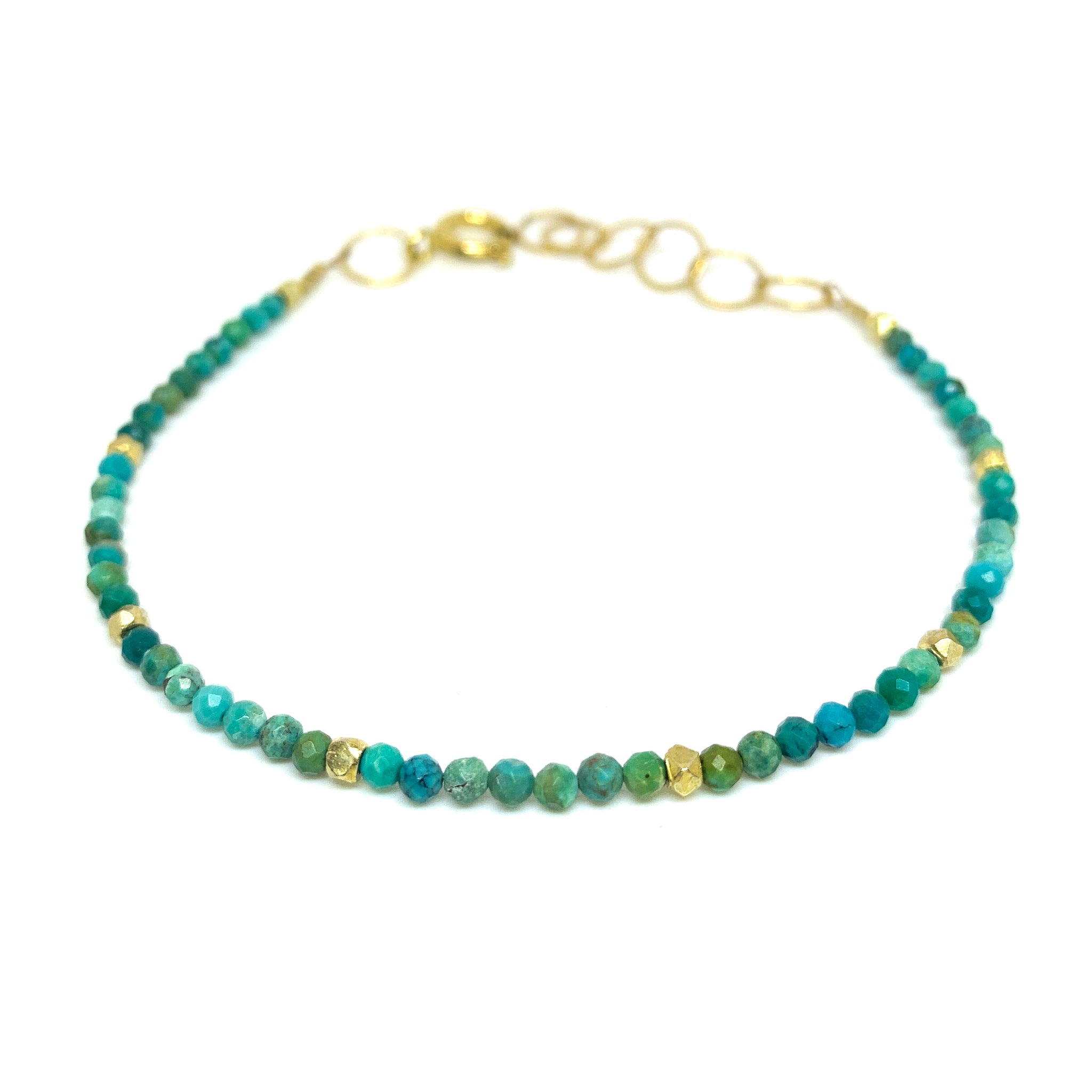 faceted turquoise bracelet with 22 karat vermeil nuggets by eve black jewelry , handmade in Hawaii